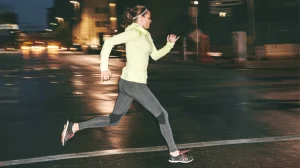 woman running at night in the street