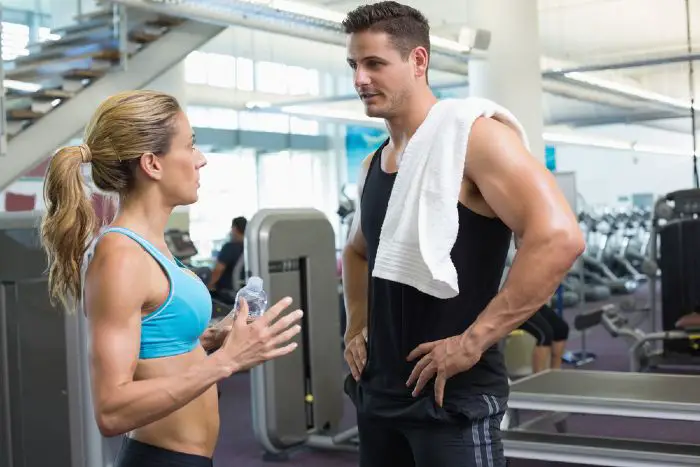 woman getting a male attention at the gym